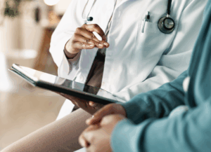 Doctor consulting with a patient.